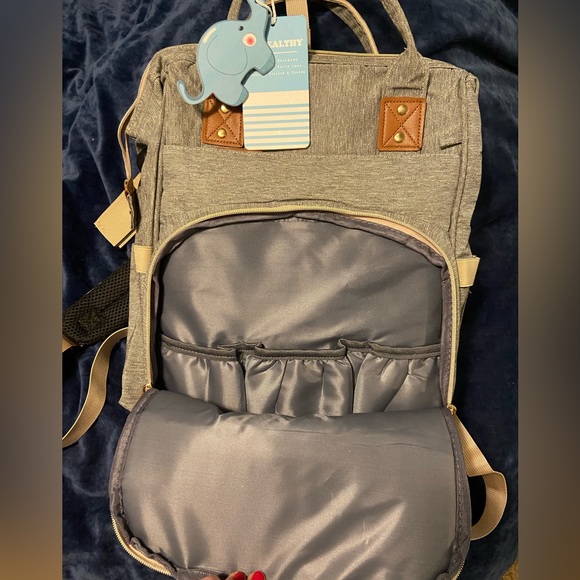 NWT Convertible backpack and diaper bag with bassinet and diaper-changing pad - Picture 7 of 8